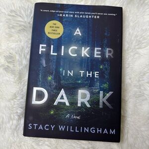 A Flicker in the Dark Hardcover Book